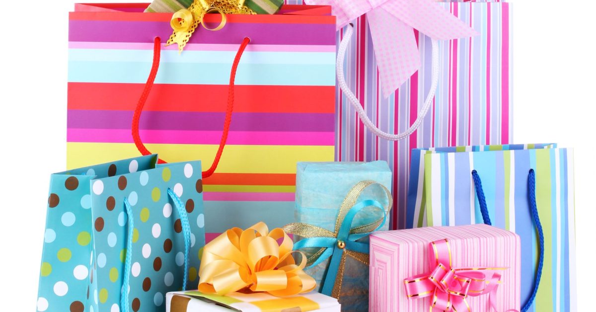 bright-gift-bags-gifts-isolated-white