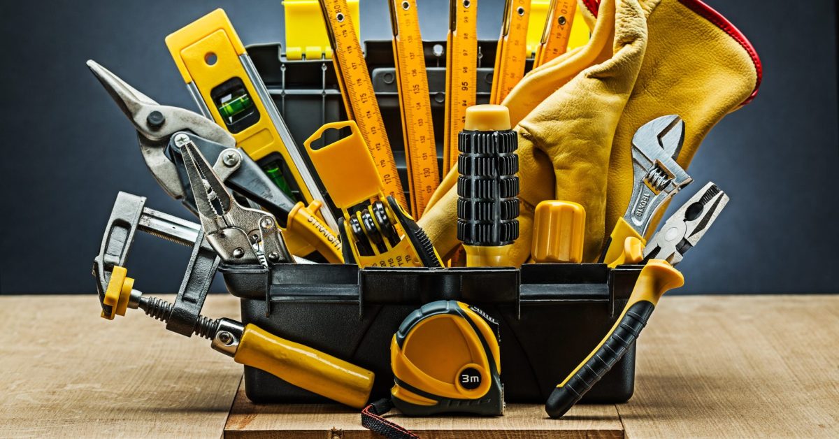 tool-box-wirh-many-construction-tools-wood-boards